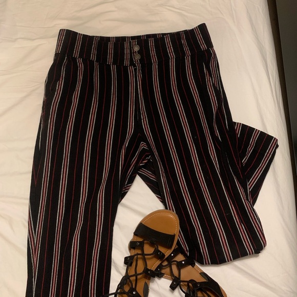 red and black vertical striped pants